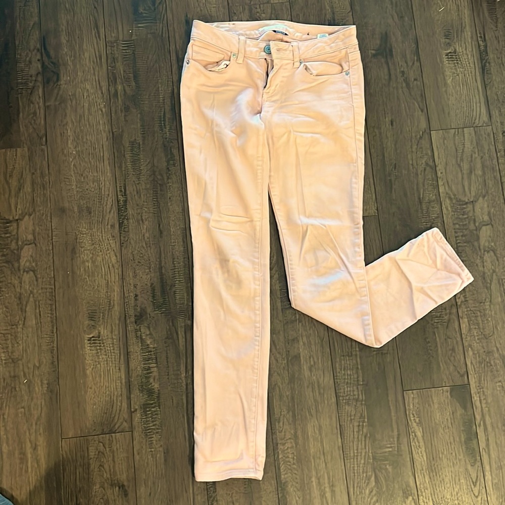 Light pink skinny jeans